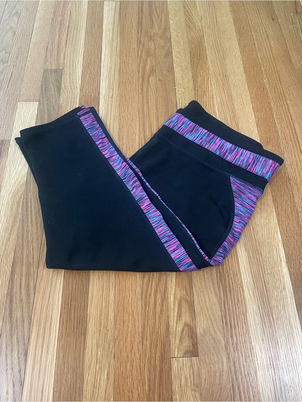 Fabletic's Camicon Capri Leggings with Multicolor Neon Pink, Blue & Purple Trim